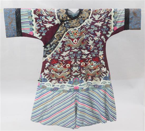 A Chinese burgundy silk kesi childs dragon robe, Jifu, late 19th century, length 95cm, adapted sleeves, removable perspex case